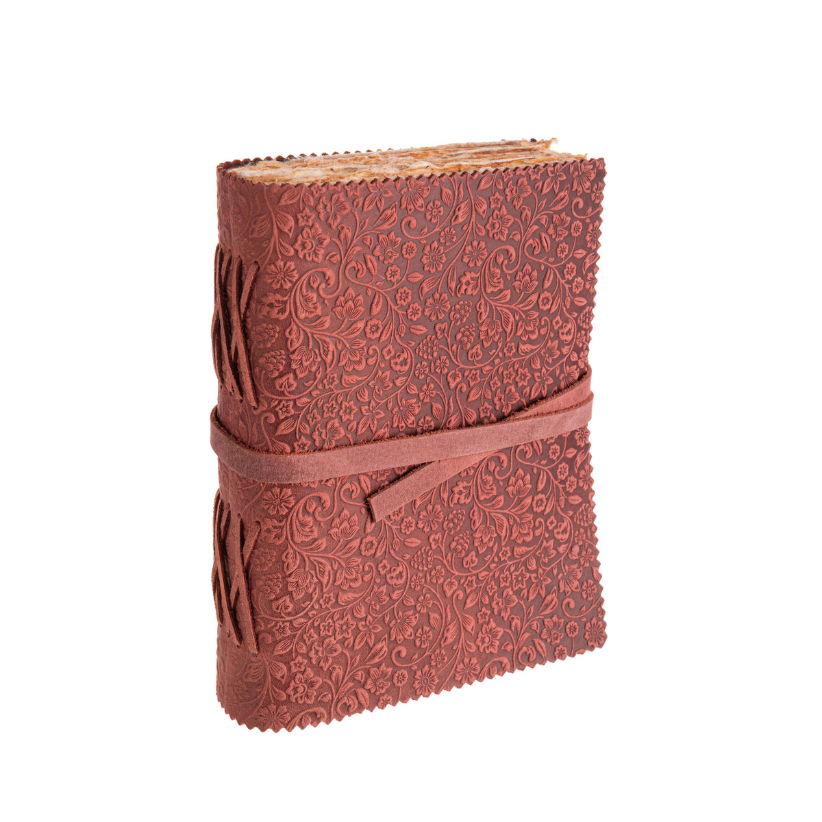 Brown embossed leather notebook with a strap on a white background