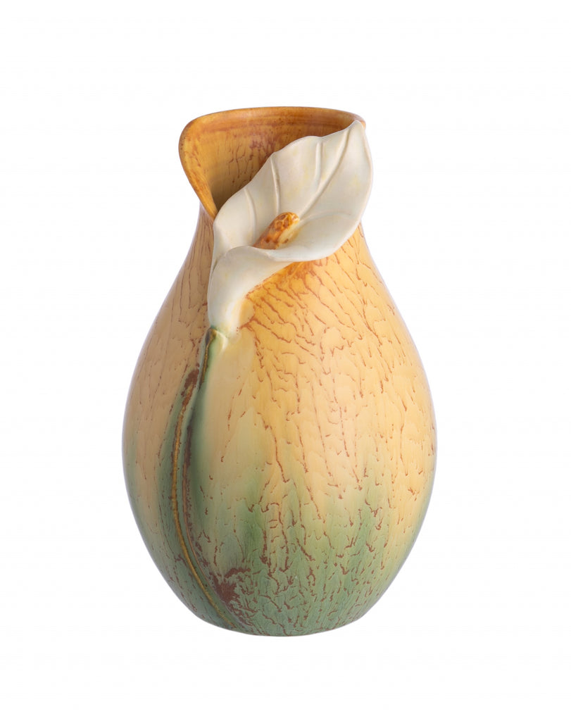 The iris is a beloved early bloomer in the perennial garden. In Greek mythology, Iris is a golden winged messenger of the gods. Thrown, sculpted and glazed by hand Size approx. 7" x 3.75" Earthenware art pottery piece - a liner is recommended for use with water.