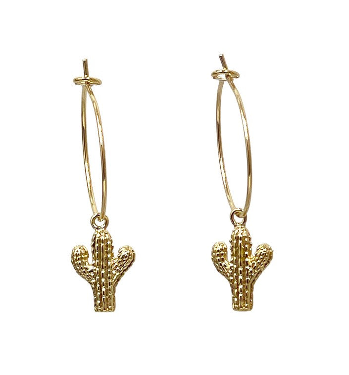Add some spiky style to your look with these Mini Cactus Hoops. Made for cactus lovers everywhere. 18k gold plated brass hoops (hypoallergenic). Nickel-free Gold-plated brass cactus charms. Dimensions: 3/4" hoops. Handmade in California