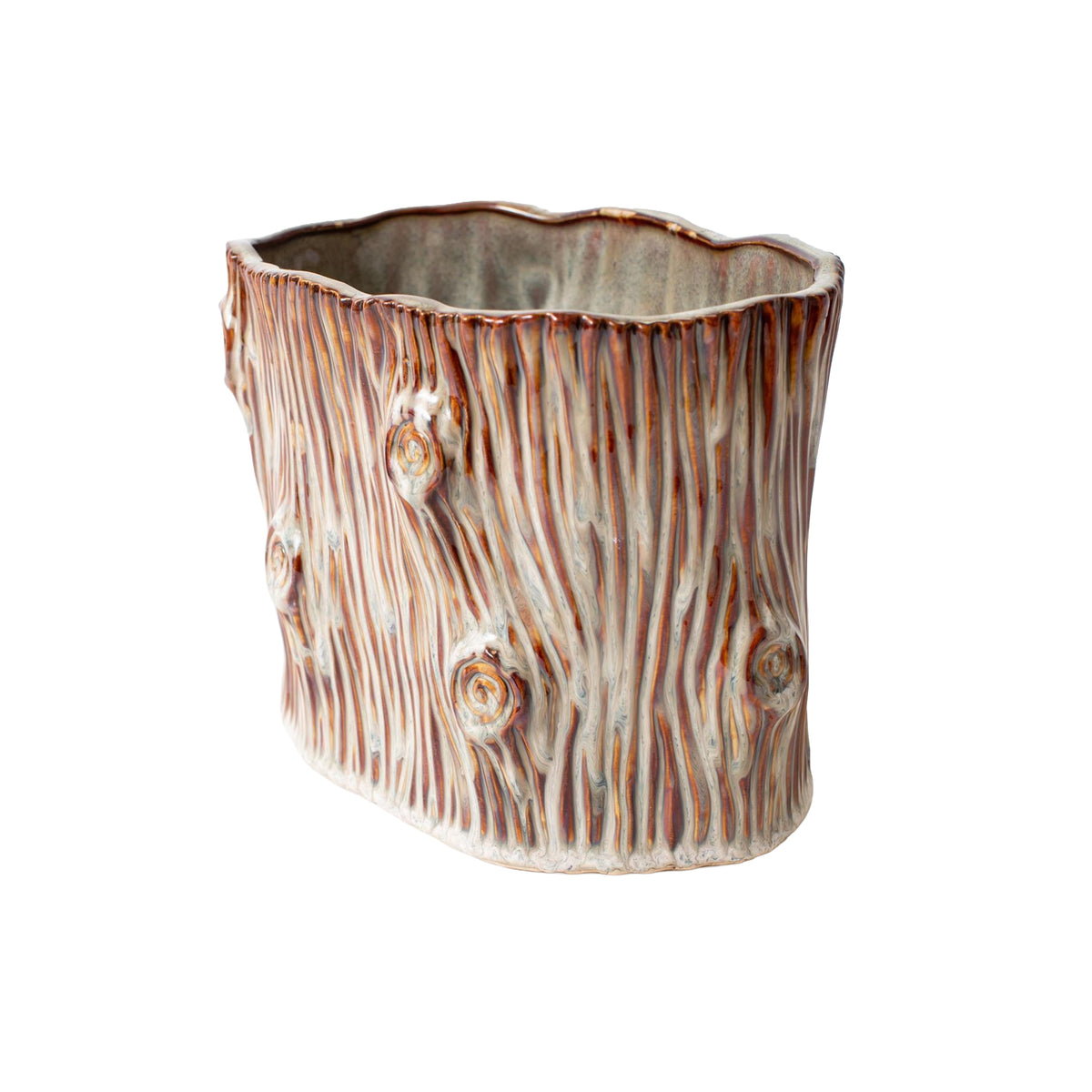 A ceramic planter shaped like a tree trunk, featuring a textured bark design with brown and beige tones, isolated on a white background.