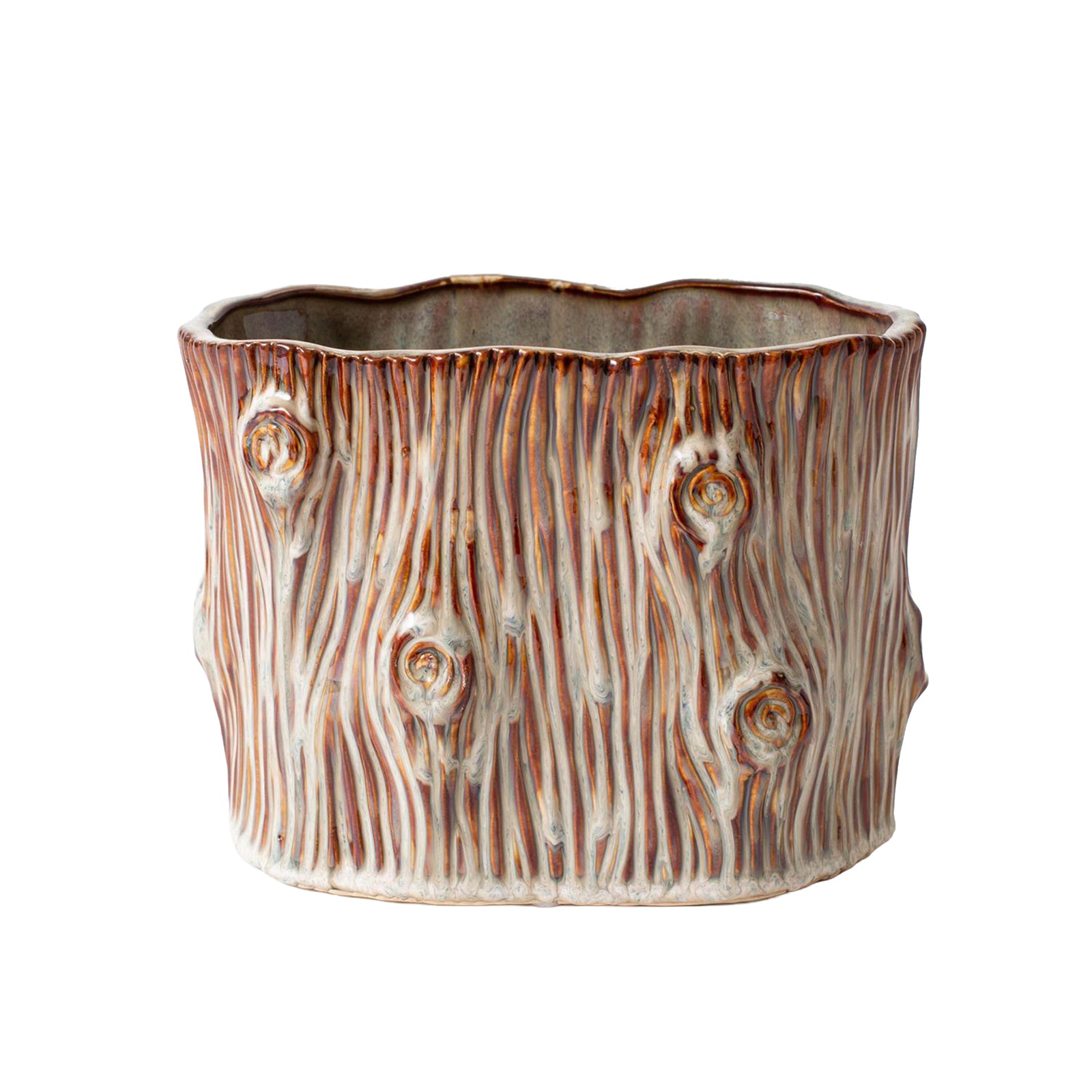 A ceramic planter shaped like a tree trunk, featuring a textured bark design with brown and beige tones, isolated on a white background.