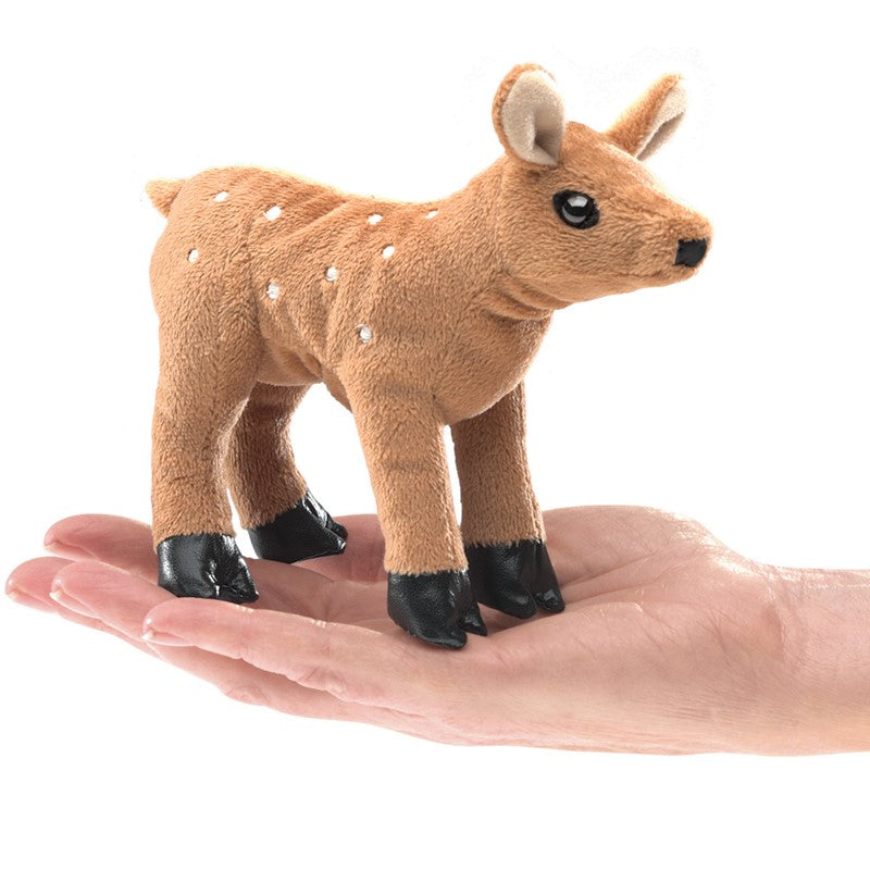 This curious and cute Fawn finger puppet is sure to steal your heart. With soft caramel fur embroidered with ivory polka dots, squishy leatherette hooves, and adorably big eyes, this mini pal may be small, but is big on encouraging imaginative play. Plush finger puppet. Dimensions: 6" x 3" x 5".