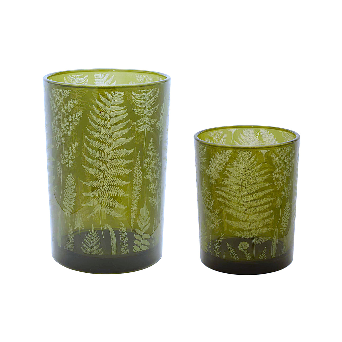 Two glass votive candle holders in green glass, decorated with a fern-leaf pattern, on a white background.