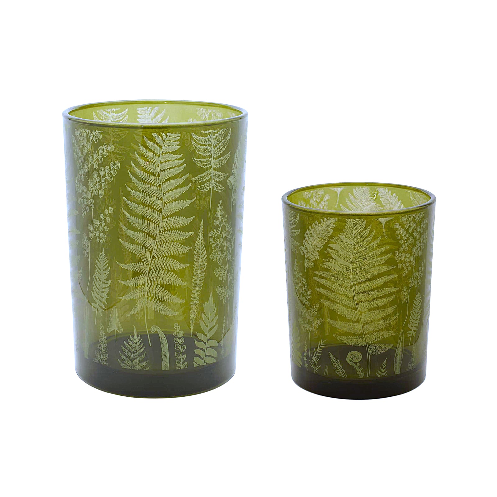 Two glass votive candle holders in green glass, decorated with a fern-leaf pattern, on a white background.