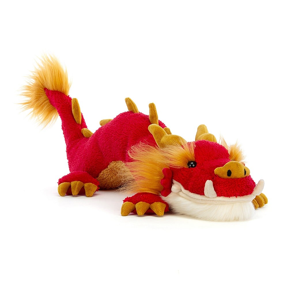 Festival Dragon is here to make a statement. A scarlet dragon with exquisite golden accents, from tummy to tail tip. Delicately finished with soft cheek tufts and suedette nose, horns, spines and claws. With a fluffy cream beard and wriggly body, this dragon is ready to dance! Dimensions: 17" x 4". 12+ months. 