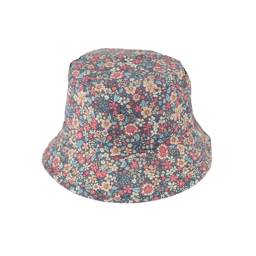 Add a burst of spring to your wardrobe with this pretty, packable bucket hat. This is the perfect hat to throw into your purse to keep the sun's rays at bay on a hike, beach trip, or flea market shopping trip. Material: 80% cotton, 20% linen Reversible (floral print / solid black). One Size: hat circumference: 24".