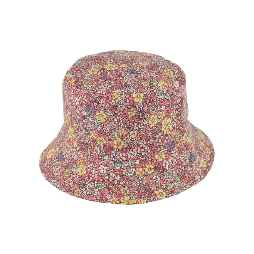 A floral cotton bucket hat with a blend of floral colors on a beige background.