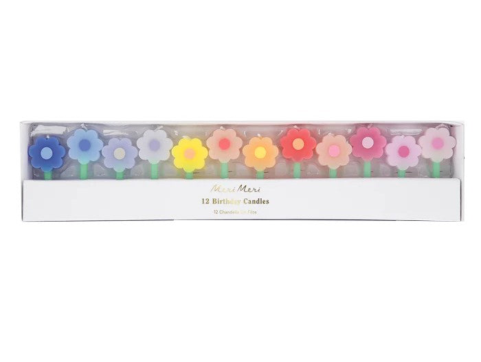 Add a rainbow of color to your cakes with these special flower candles. This set of mini candles is all you need for an instant cake decoration, or team with toppers for extra effect. Perfect for a baby shower, bridal shower, garden party or birthday cakes. Daisy wax candles in shades of blue, yellow, red, pink and green It is recommended to use the candles in conjunction with suitable candle holders Pack of 12 in 12 colors Dimensions: average candle height (includes stick) - 2.125"