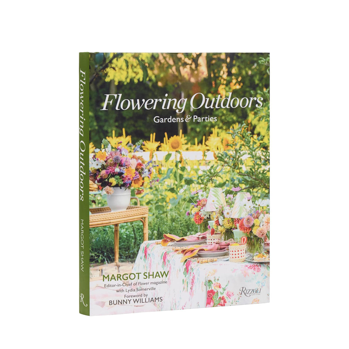 The book 'Flowering Outdoors: Gardens & Parties' by Margot Shaw and Bunny Williams, featuring a green spine and cover with a colorful garden party table setting.