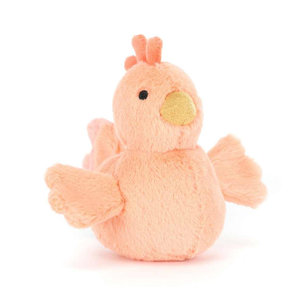 Fluffy Chicken is a very proud bird with apricot fur, a two-tone comb, and a mustard suedette beak! Plump and poised with fan-shaped wings and a gorgeous matching tail, this huggable chicken is ruling the roost! Dimensions: 4.3" x 2.4" x 4.3"