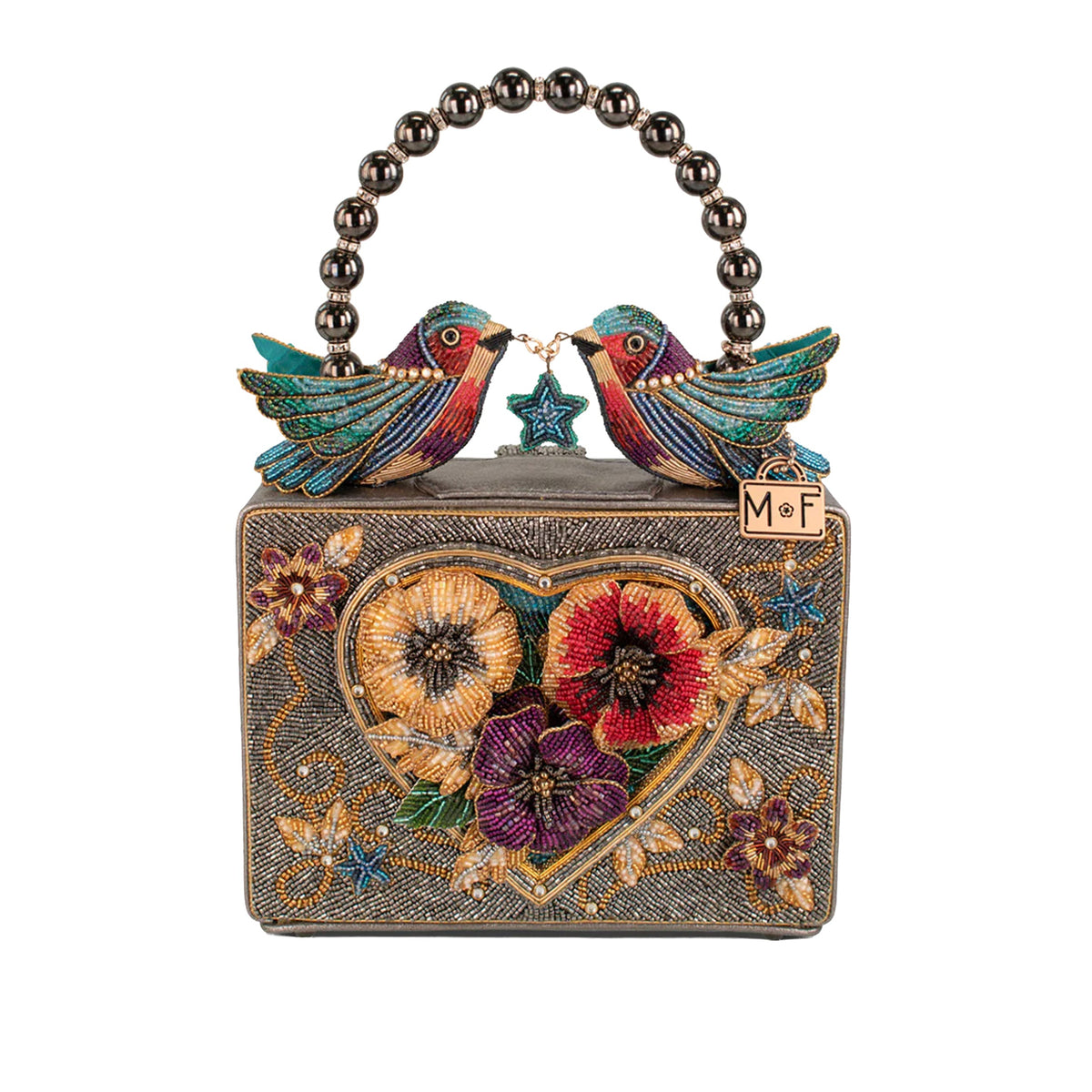 A decorative evening clutch bag with a beaded metallic handle, featuring two colorful birds and a heart-shaped floral motif on a textured dark background. 