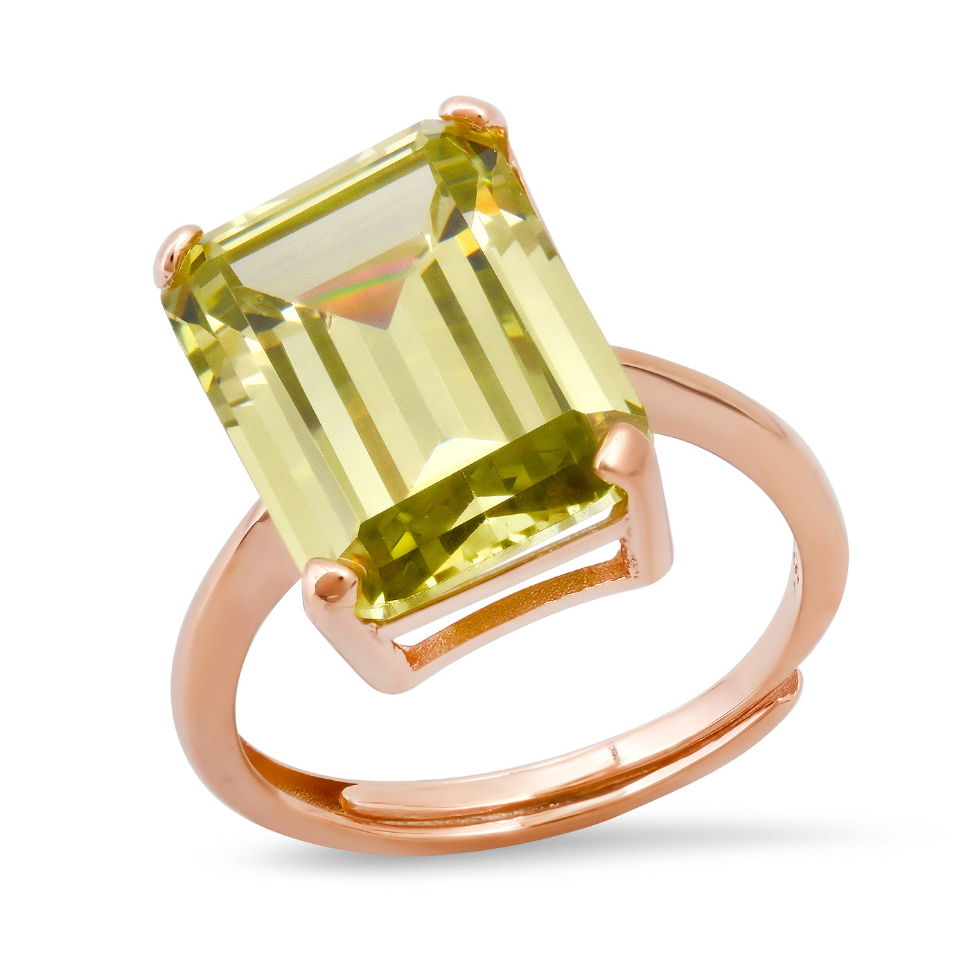 Add some serious sparkle to your everyday with this twinkling chartreuse perigold ring. The adjustable band is made from brass, plated with rose gold which gives the prettiest contrast to the green-hued stone. Materials: Brass, rose gold plated, perigold stone Adjustable ring band - fits most. Stone size: 0.5" x 0.4"