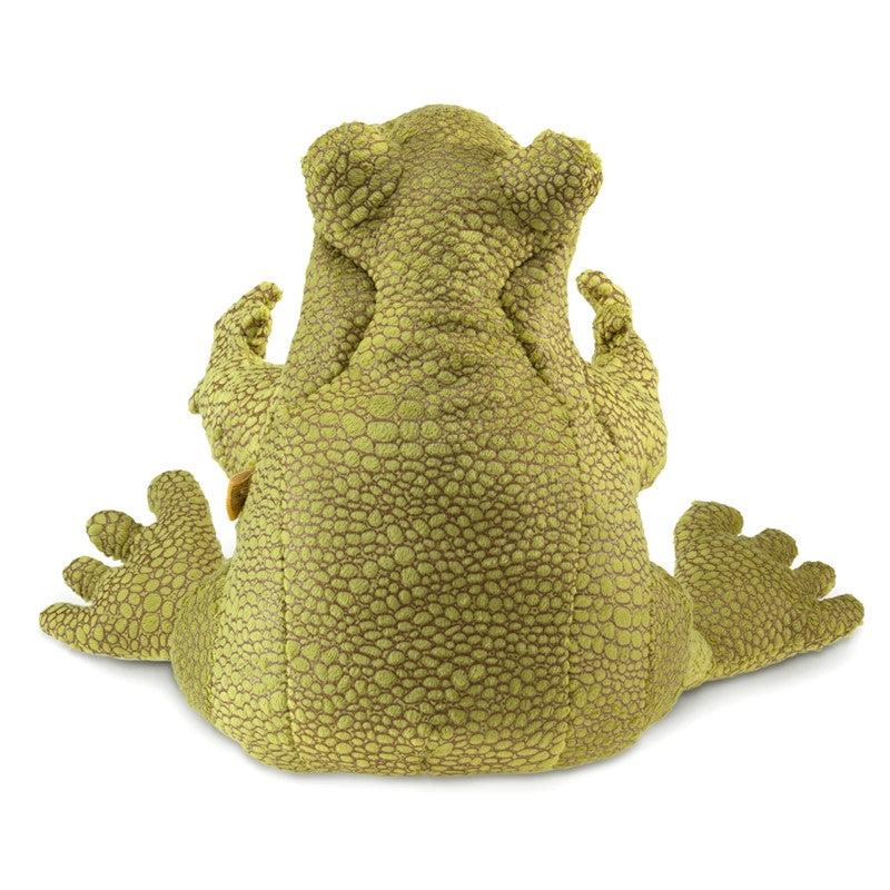 Plush frog toy on a white background