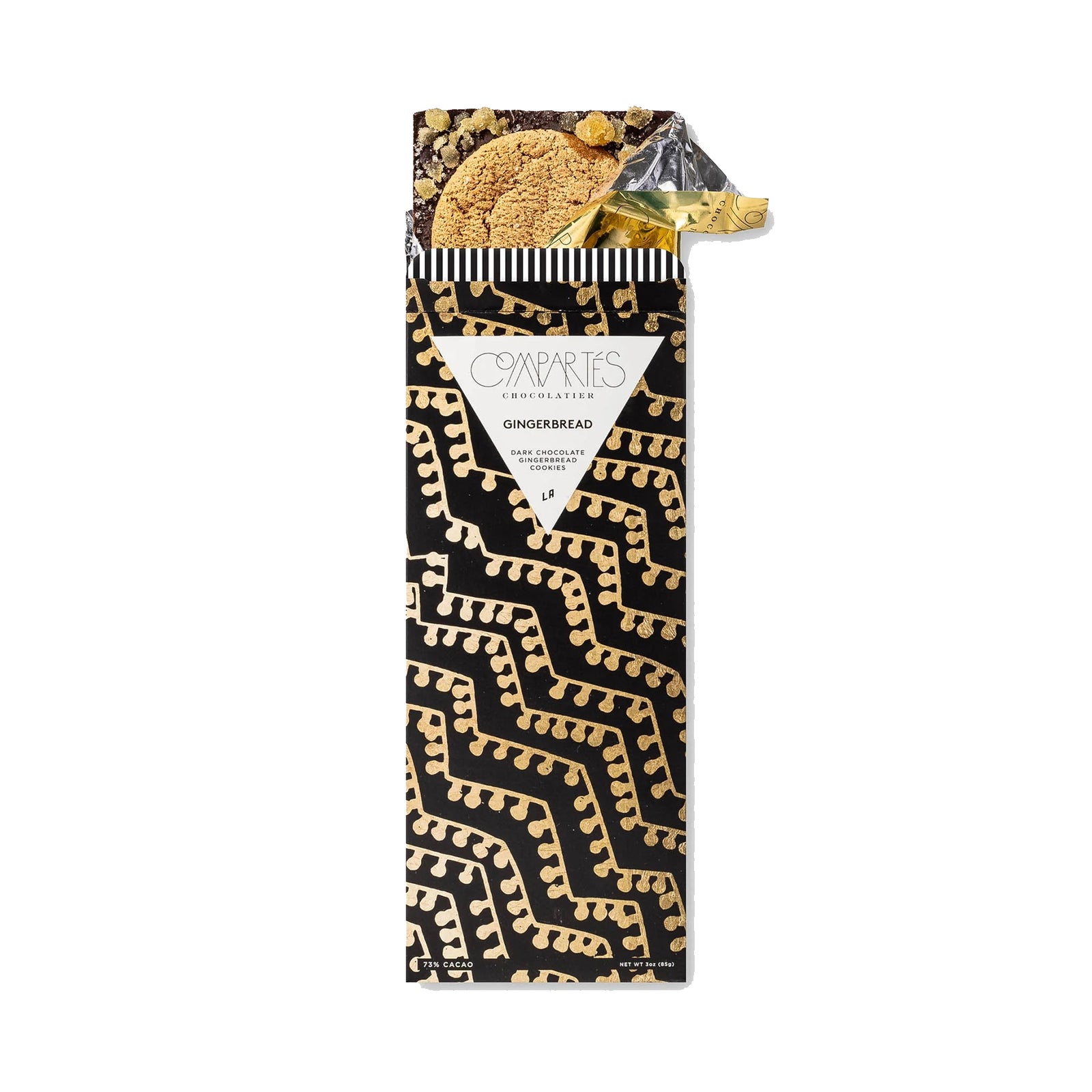 Packaged gingerbread chocolate bar with a decorative black and gold wrapper on a white background.