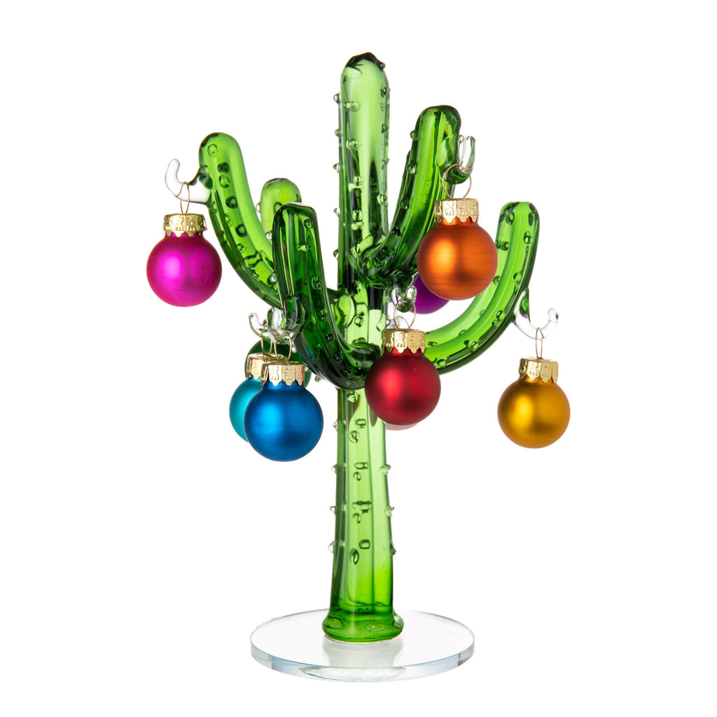 This hand-crafted glass cactus tree makes a fun, eye catching decor piece, year-round. Decorate with the miniature glass ornaments included for or add your own ornaments. Also great as a table centerpiece, or even to display small items of jewelry. 4.33" (D) x 4.33" (W) x 6.69" (H) Includes 9 miniature glass ornaments.