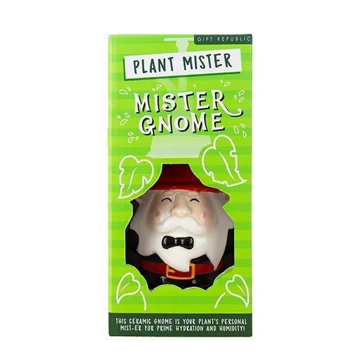 Hand holding a gnome-shaped plant mister on a white background