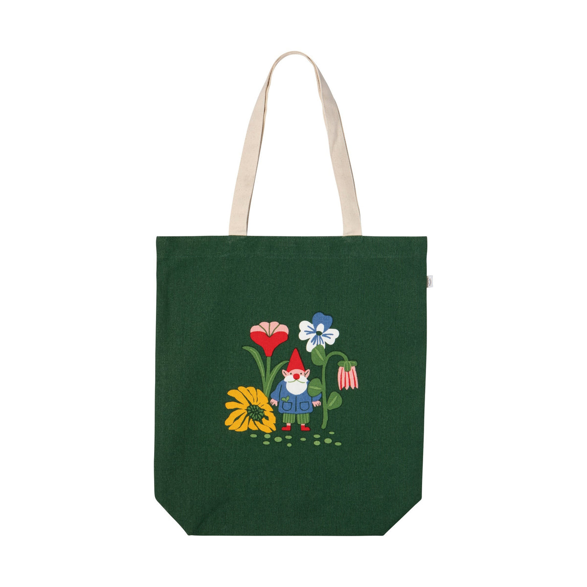 A dark green canvas tote bag with beige shoulder straps, featuring a colorful printed design of a gnome surrounded by flowers on the front.