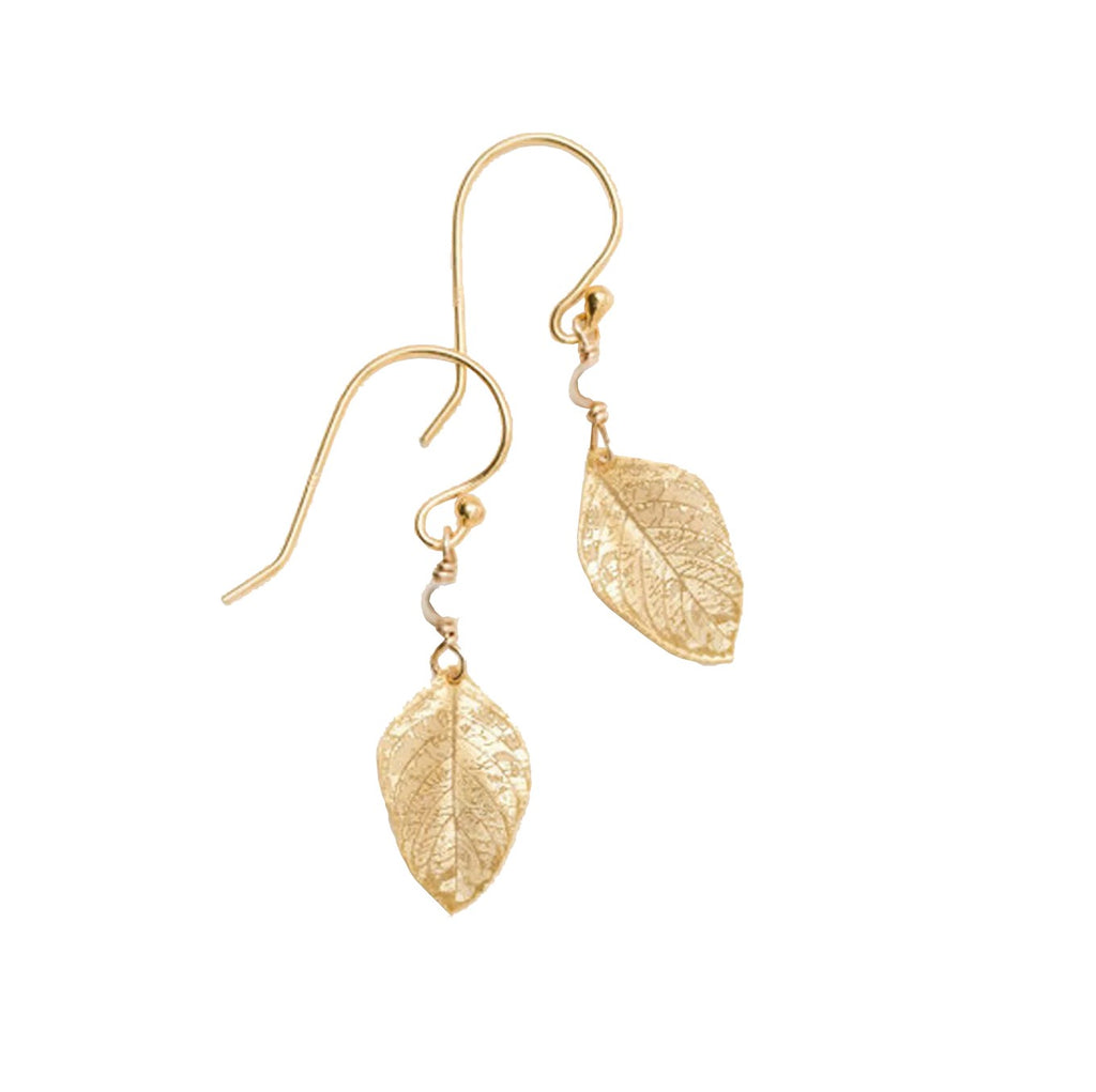Artful symbols of the restorative power of nature, these dainty healing leaf earrings feature delicate coloring, a true-to-life pattern and cutwork, and a subtly hand-hammered finish. These elegant earrings are 18k gold plated and are finished off with a pretty vegan seed pearl. Dimensions: 1/2" × 3/8".