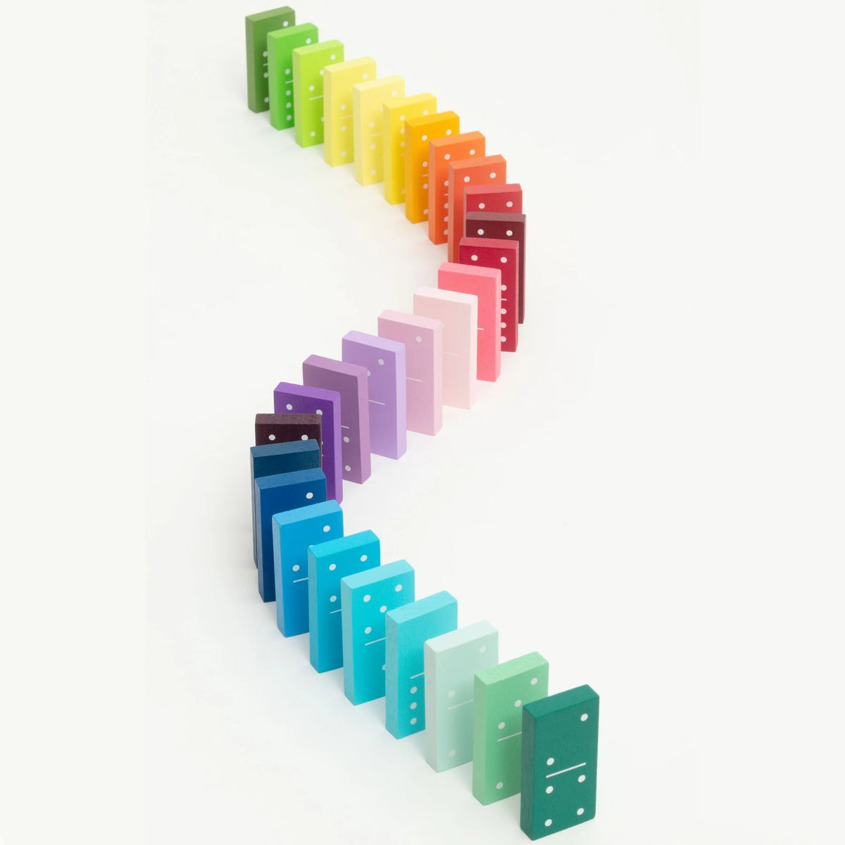 Set of colorful dominoes arranged in a line on a white background