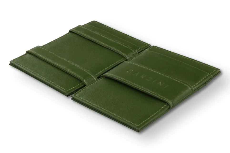 This handcrafted, vegan cactus leather wallet in an attractive forest green, can hold up to 10 cards and offers easy and quick access, equipped with RFID protection. This magic wallet is both stylish and practical. 2.95 x 4.25 x 0.39 inches. Stores cards, banknotes, receipts and business cards.