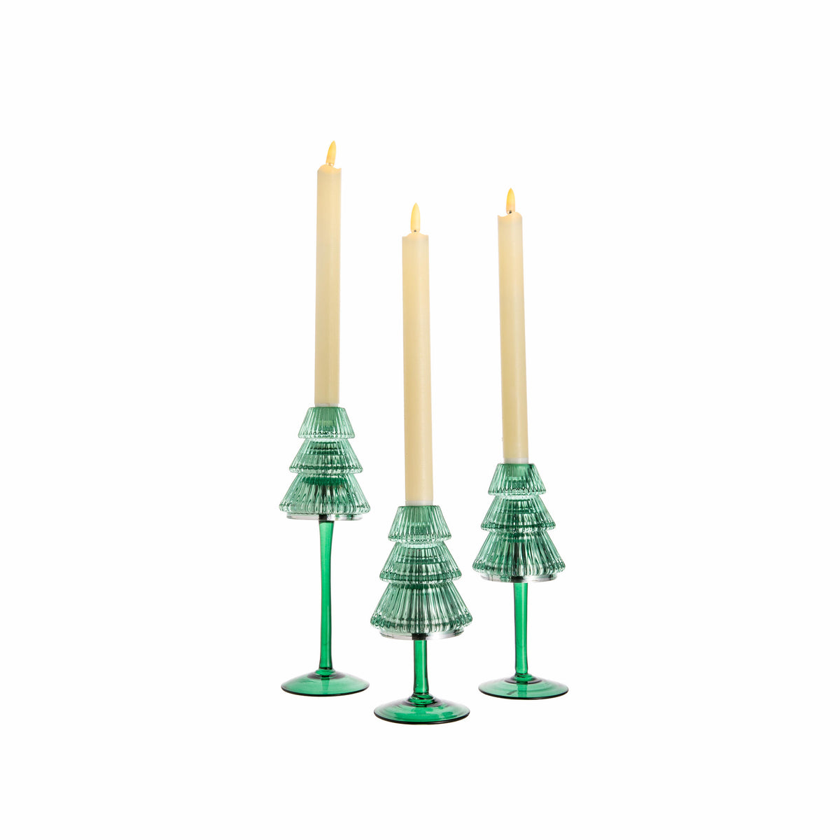 Three green candle holders with candles on a white background