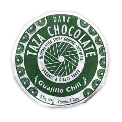 Stone ground, organic Mexican-style dark chocolate discs bursting with a punch of sweet heat from guajillo chilis. These rustic, minimally processed discs let you experience chocolate with true grit! Two delicious chocolate discs in each package, perfect for sharing. 50% 2.7 oz. Vegan. 