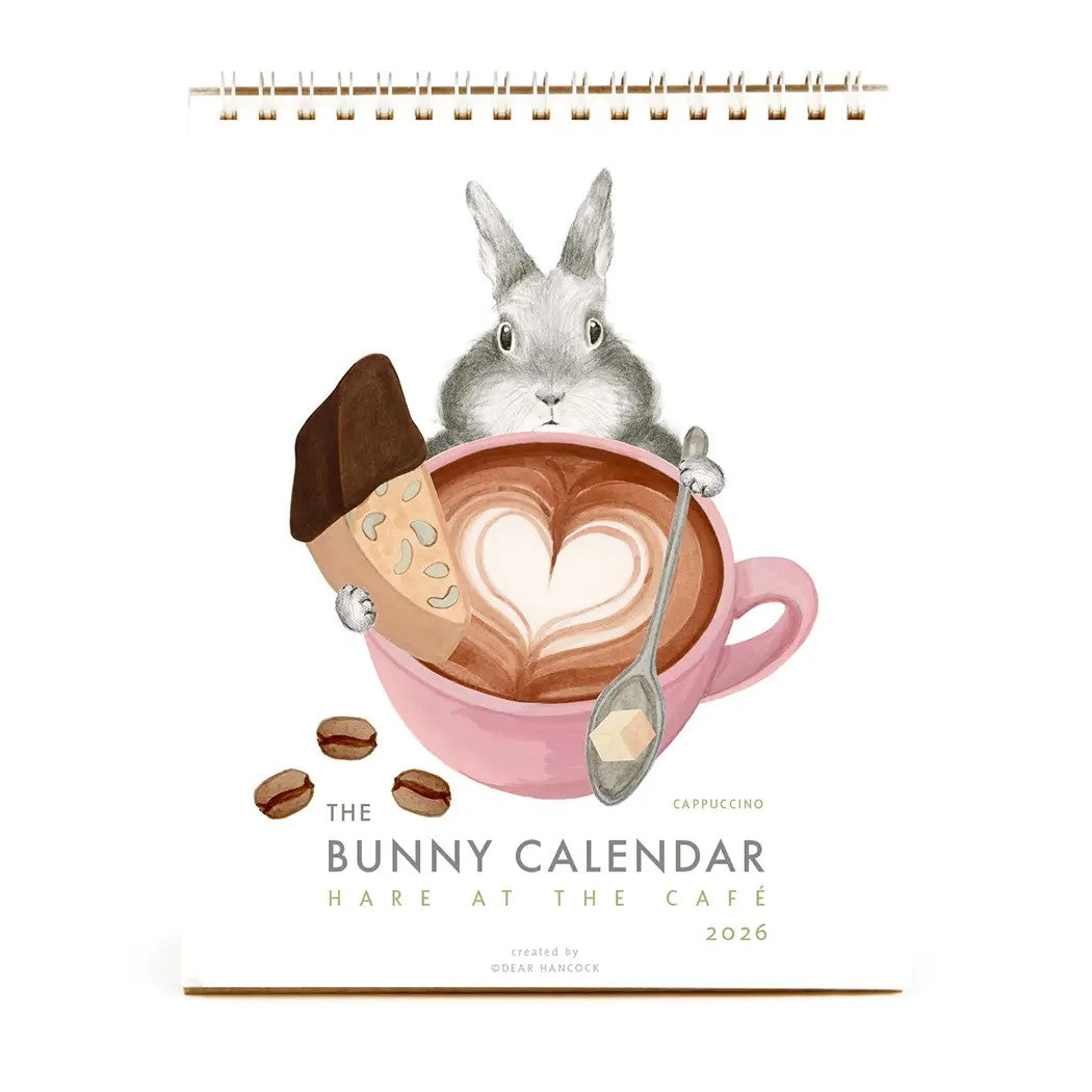 Calendar cover with a rabbit in a pink cup of coffee, titled 'The Bunny Calendar: Hare at the Cafe'.