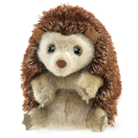 Don't hedge your bets! This Hedgehog puppet has places for all five digits, has a soft, short plush face and underbelly and a shaggier back and head. It can turn inside out to form the kind of ball a real hedgehog rolls into for protection from predators. Plush toy / hand puppet Moveable head, arms, & legs. Turns inside out and curls into a ball - just like a real hedgehog! Dimensions: 5" x 5"