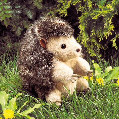 Don't hedge your bets! This Hedgehog puppet has places for all five digits, has a soft, short plush face and underbelly and a shaggier back and head. It can turn inside out to form the kind of ball a real hedgehog rolls into for protection from predators. Plush toy / hand puppet Moveable head, arms, & legs. Turns inside out and curls into a ball - just like a real hedgehog! Dimensions: 5" x 5"
