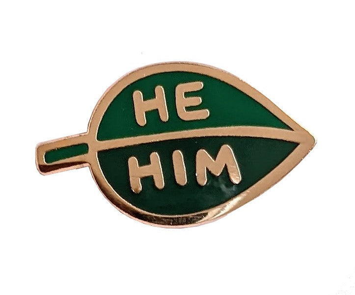 This two-tone enamel leaf he/him pronoun pin allows you to communicate your preferred pronouns in a cute and subtle way. Pin to lapels, backpacks, sneakers and more! Materials: metal and enamel Pin fastening with rubber stopper Dimensions: 1" x 1.5"