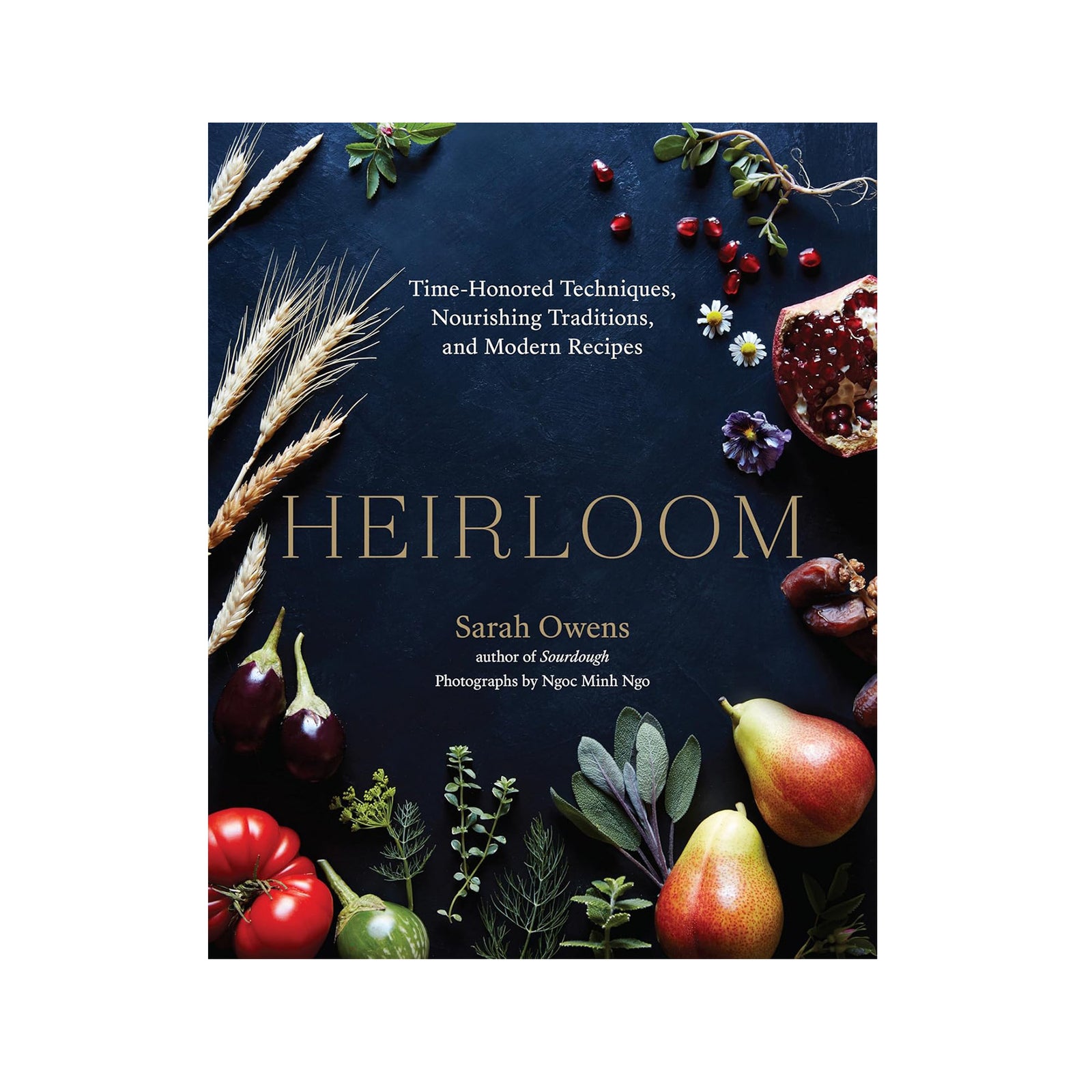 Book cover of 'Heirloom' with various fruits and plants on a dark background