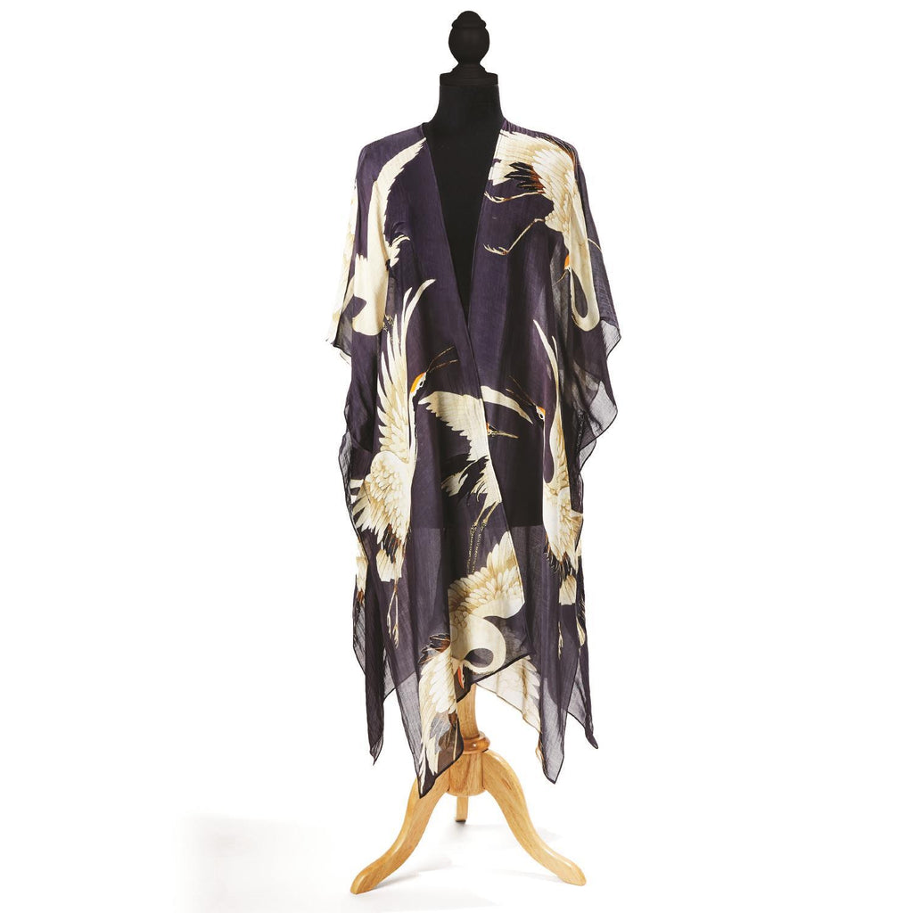 The perfect summer cover up, in a vintage Japanese style Heron print. This long kimono has a gauzy feel and is lightweight enough to fold up and pop in your purse, but also heavy enough to keep the chill off when the sun goes down. Features a Heron print on a charcoal base.50% Modal,50% Tencel. One size. Hand wash.
