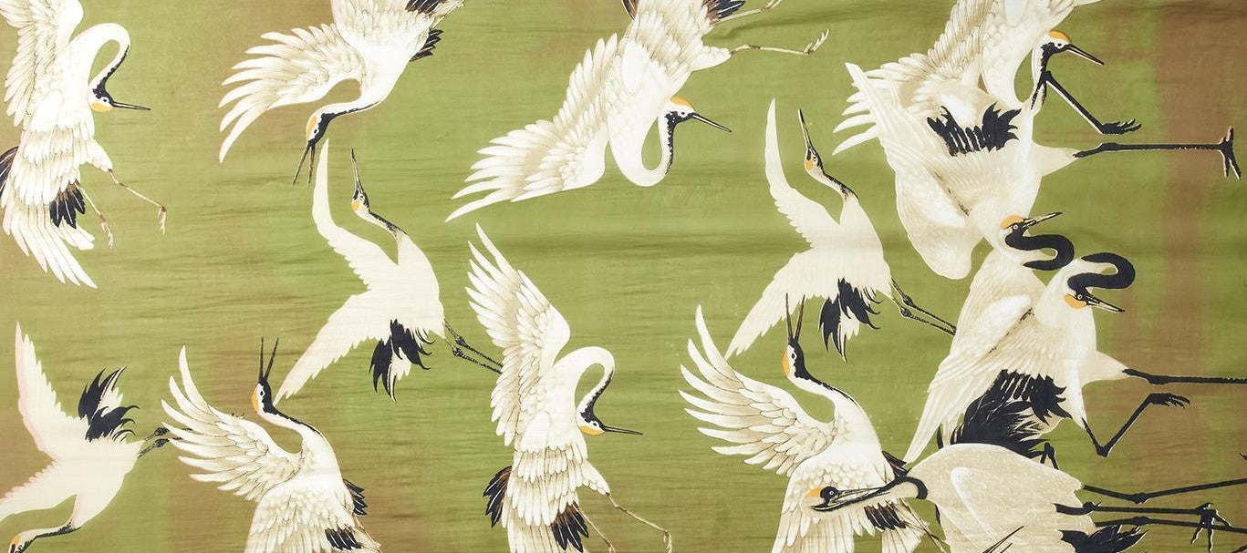 Olive green is the perfect neutral backdrop for a flock of beautiful herons. The long length of this scarf makes it super versatile - wear it as a scarf, sarong, a topper and more! Lightweight and super soft, it is made from an eco-friendly custom blend of 50% Modal & 50% Viscose. Scarf size: 40" W x 78 50%. Hand Wash.