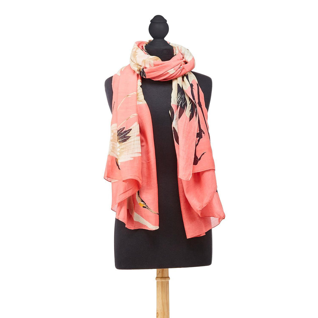 Jump onto the pink trend - but make it elegant - with this gorgeous heron print scarf on a flattering peony pink background. The long length of this scarf makes it super versatile. Lightweight and soft, it is made from an eco-friendly custom blend of 50% Modal & 50% Viscose. 40" W x 78.