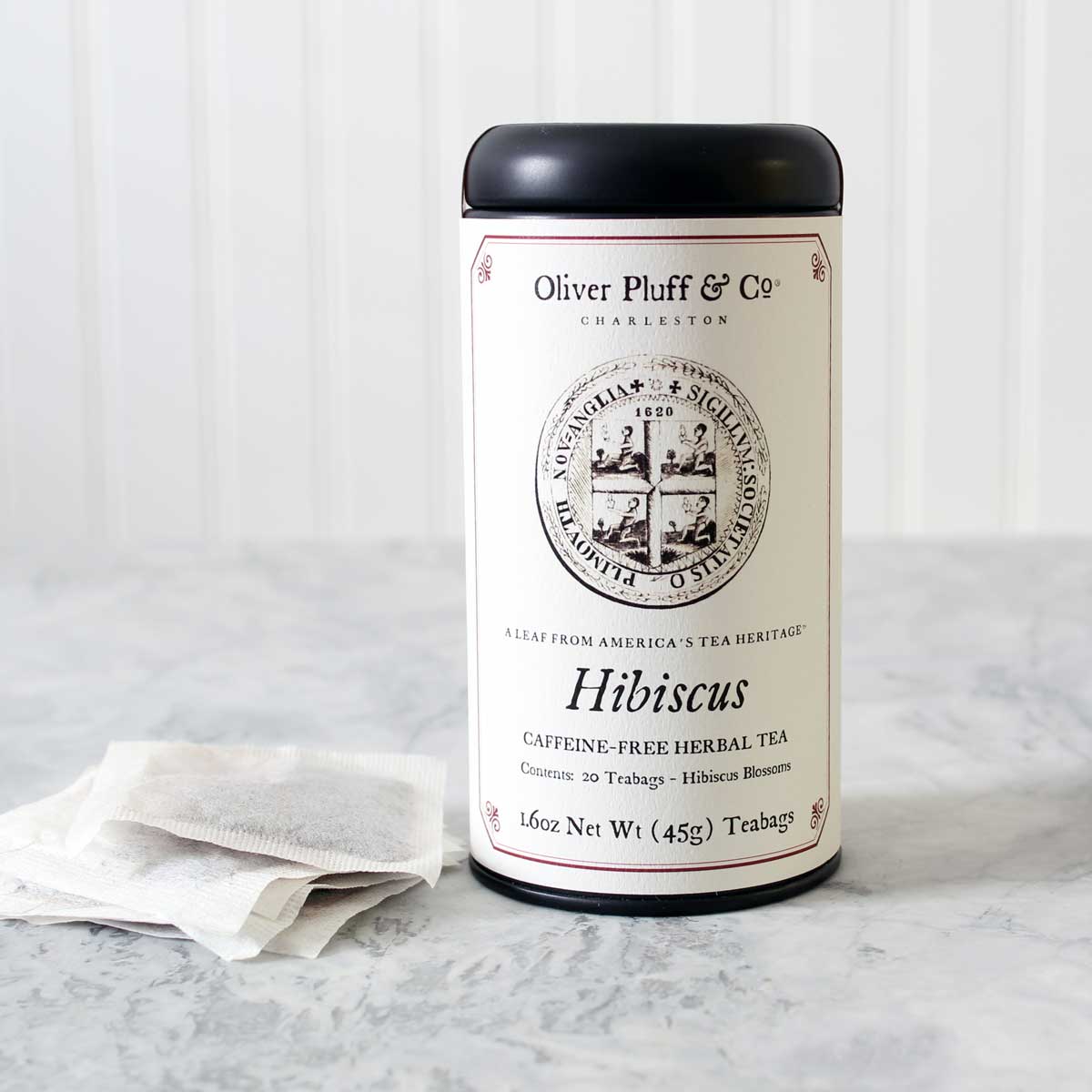 These caffeine-free herbal tea bags are filled with dried Hibiscus blossoms and has a tart, refreshing, lightly floral taste. Serve hot or over ice. Ingredients: Hibiscus blossoms. Tea tin contains 20 pyramid style teabags. Net Wt. 1.6 oz.