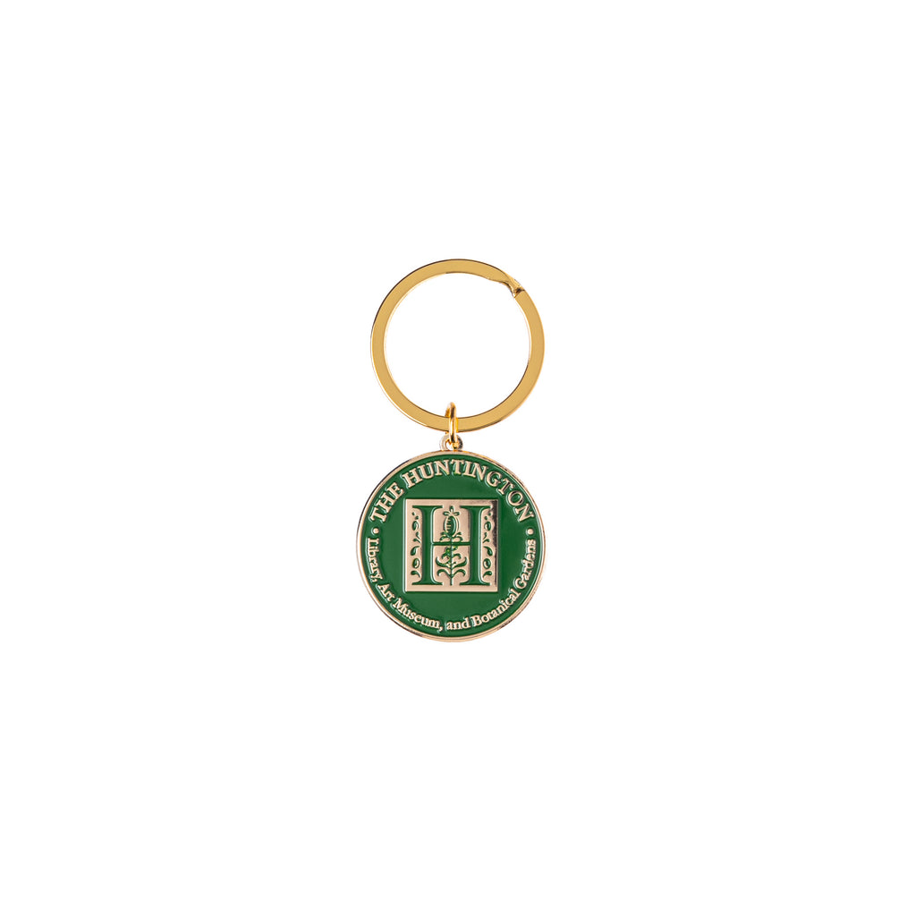 Keep The Huntington close with this charming and handy little keepsake keychain. Features the iconic Huntington 'H' logo with dark green enamel finish. 1" diameter Brass Exclusive to The Huntington Store.