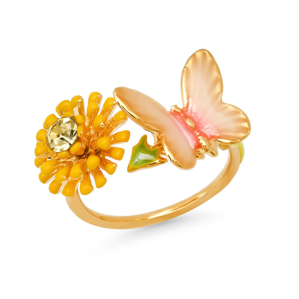 Carry the essence of spring with you, all year round with this fun dandelion and butterfly ring. The ring has an open band, allowing you to adjust to fit any finger. Let this whimsical piece dance through the day with you. Open band ring - one size fits most Materials: Brass, enamel, crystal stone.