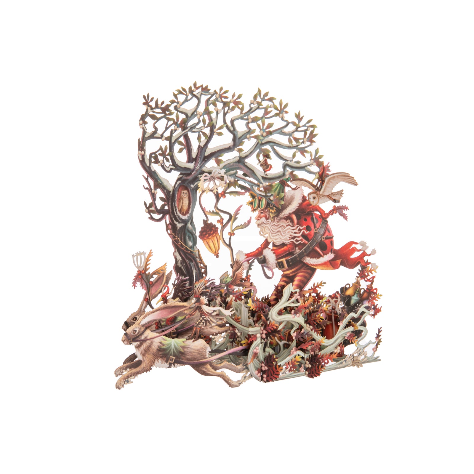 Decorative pop-up Christmas card with a fantasy design featuring Santa, a tree, figures, and animals on a white background.