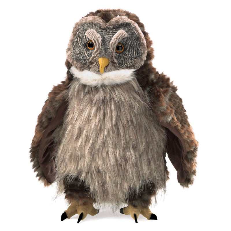 This charming Hooting Owl hand puppet is a big night bird on the hunt for fun. Hear the call of the wild when you gently squeeze the body of this Great Gray Owl. Great as a cuddly plush toy, this wise owl also encourages imaginative play when used as a hand-puppet. Dimensions: 7" x 10" x 16".