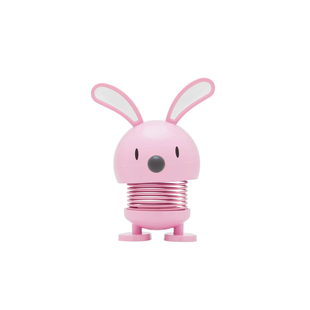 A pink bunny-shaped spring toy with long ears, a round head, and a coiled spring body, centered on a plain white background.