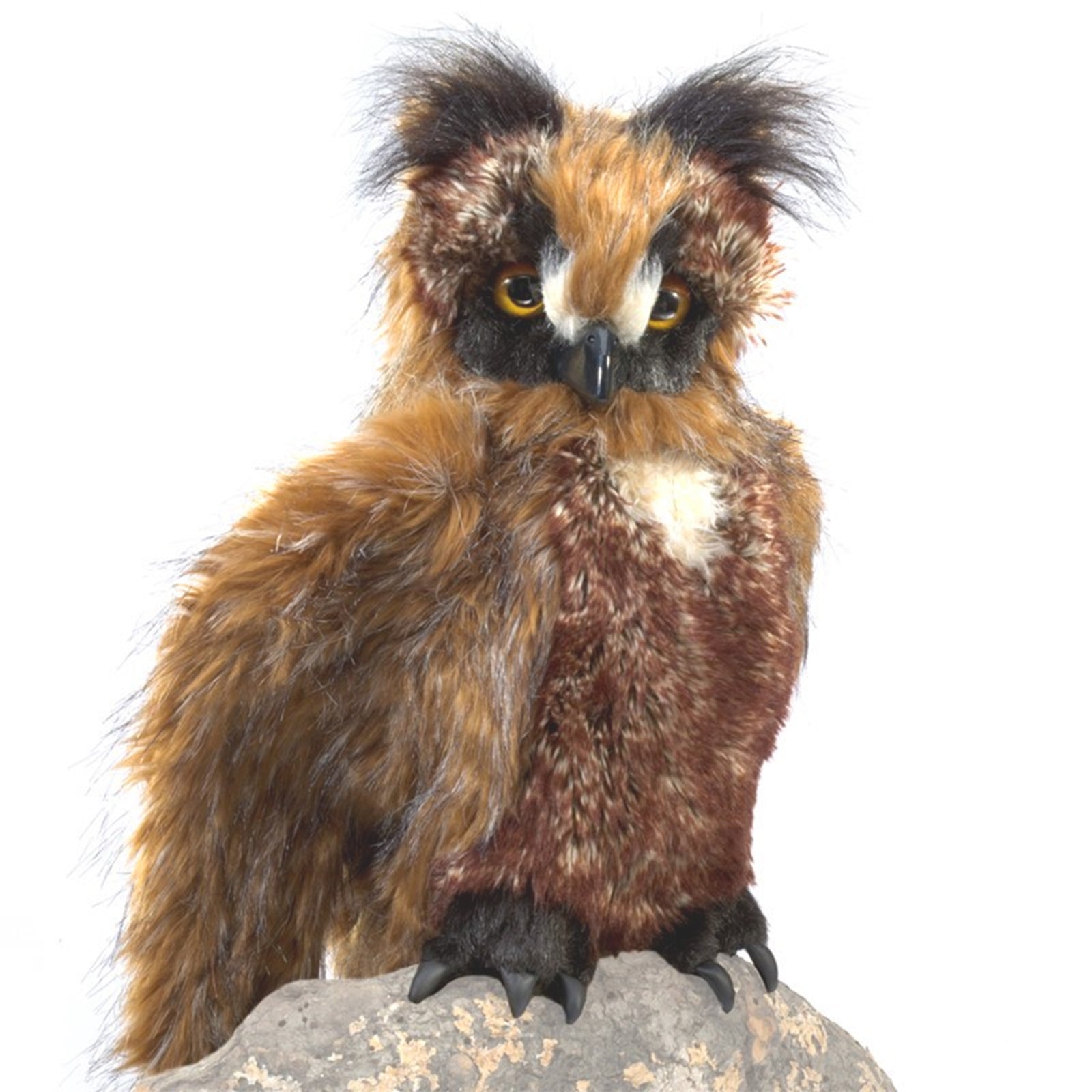 Horned owl hand puppet on a white background