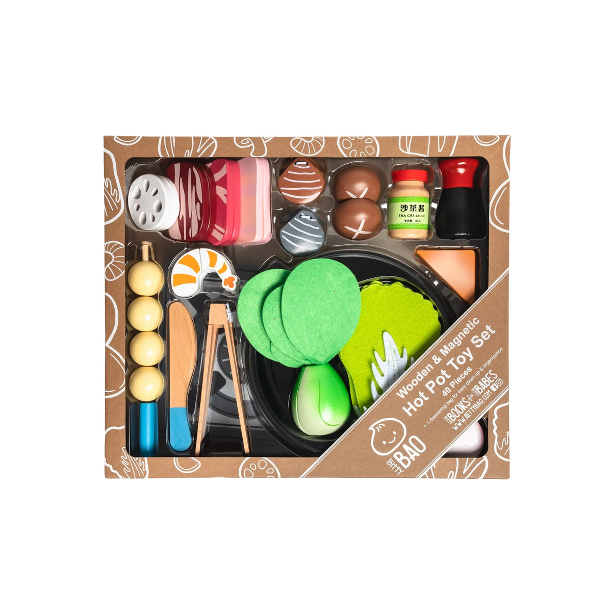 A wooden and magnetic hot pot toy set by Bad Bad Company, displayed in its original cardboard packaging. The set includes wooden utensils, colorful magnetic pots, bowls, and food pieces, all neatly arranged inside a brown patterned box.