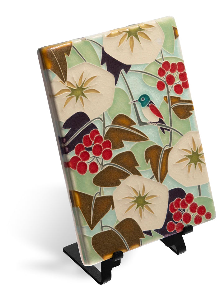 Motawi collaborated with illustrator Cary Phillips on this vivid Hummingbird design. Phillips' work has been used in children's books, greeting cards, and even on fabrics. As each Motawi tile is crafted by hand, dimensions may vary by up to 1/16". Tiles are 5/8" thick and have a notch at the back for hanging. 