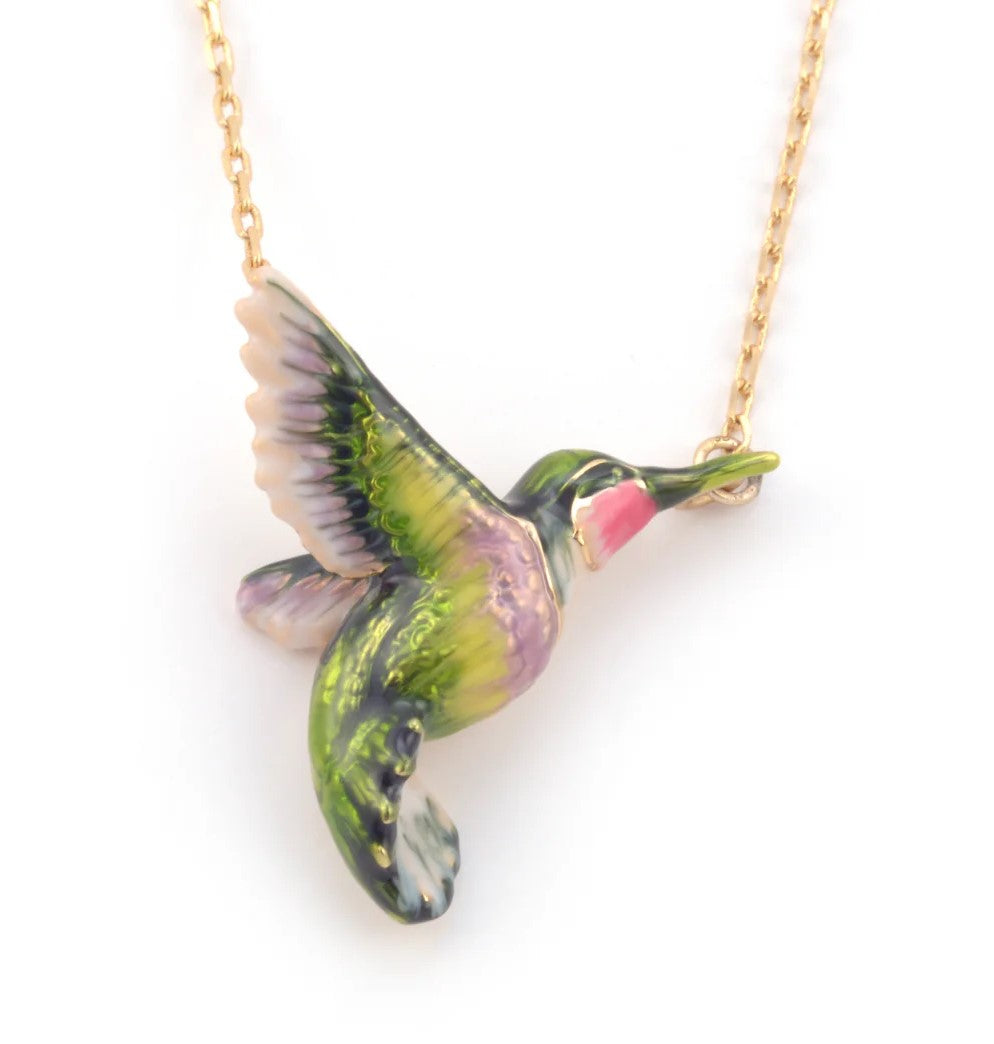 A beautiful hummingbird symbolizing life, love & Joy is brought to life in intricate enamel detail on this delightful pendant necklace. Presented on a 18ct gold plated chain this pendant. 18ct gold plated chain, enamel Chain length: 15" with 2" extender.