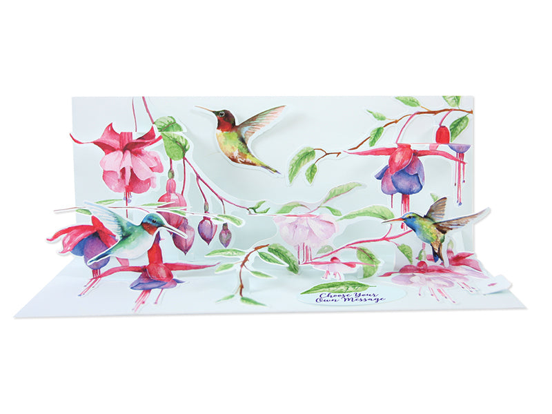 This cleverly designed pop-up greeting card showcases the beloved hummingbird with pretty pink flowers. Also included are four self-adhesive message tags: Happy Birthday, Happy Mother's Day, Feel Better Soon and a blank sticker for your own message - the perfect greeting card for almost any occasion.  9" x 3.75".