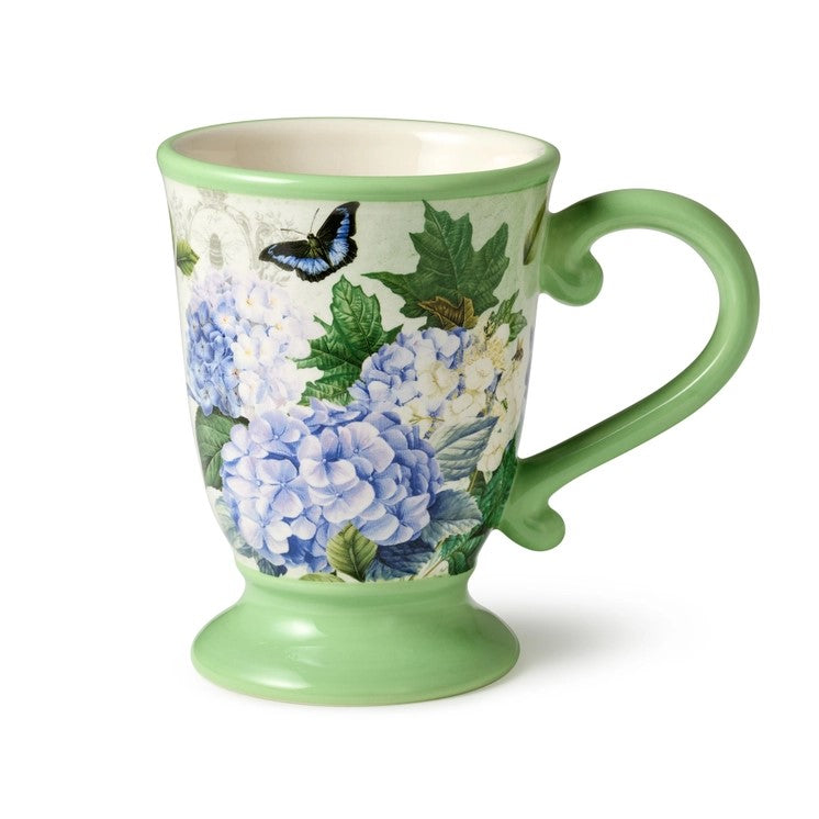 Elevate your morning routine or afternoon tea with this charming mug, featuring blue and white hydrangeas, accented by delicate green foliage and vibrant butterflies. This eye-catching ceramic mug combines beauty with functionality, perfect for savoring coffee, tea, or hot cocoa.