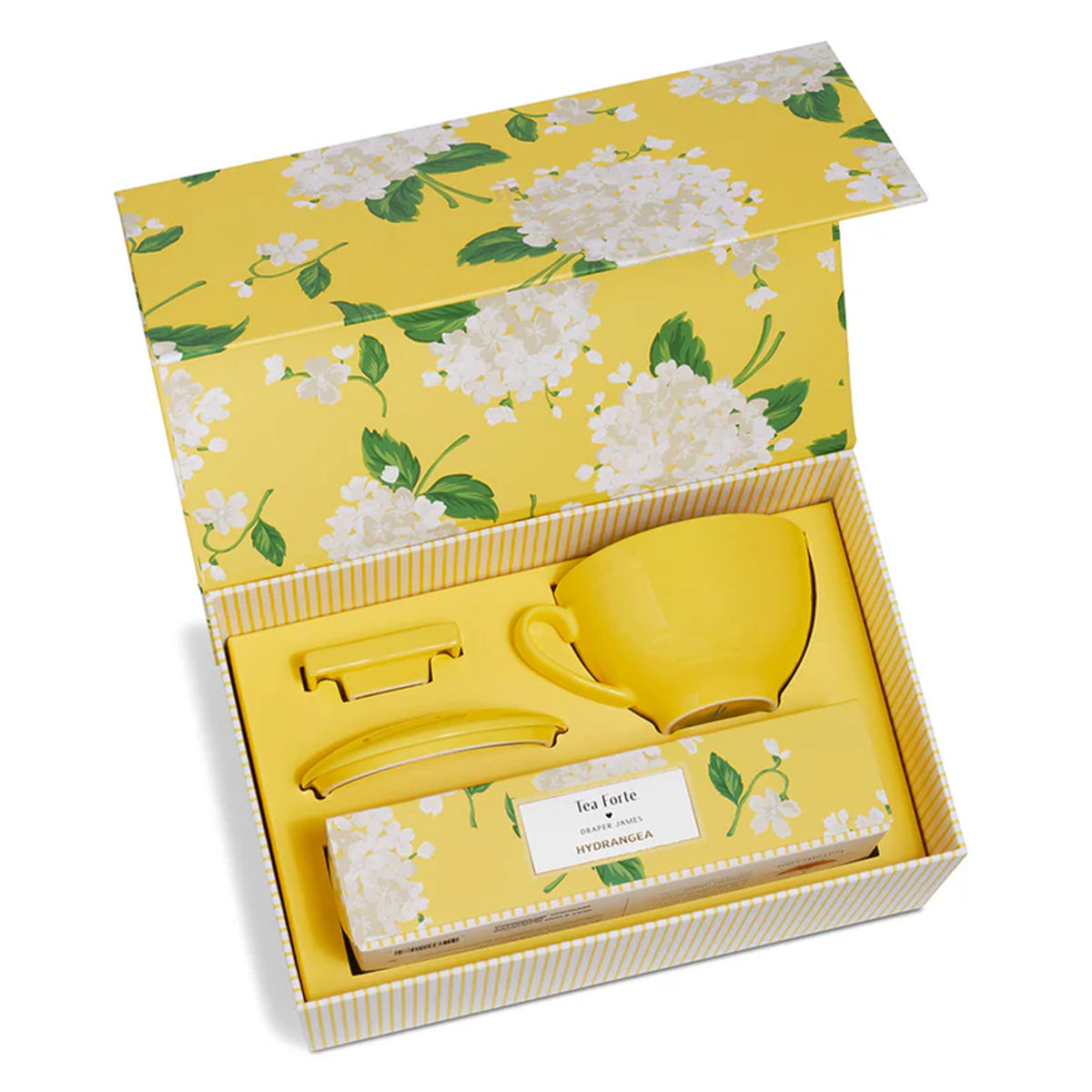 Yellow tea set with cup, saucer, and teabag in a floral-patterned box.
