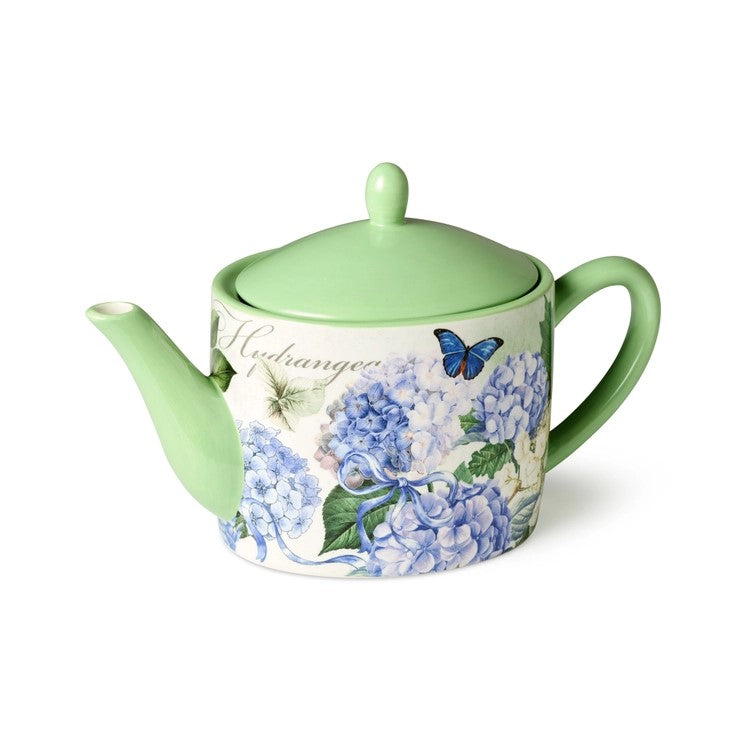 This wonderfully pretty teapot features a charming blue and white hydrangea design, beautifully complemented by delicate butterfly accents. This teapot combines timeless elegance with practical functionality, making it a versatile addition to your kitchen or dining decor.