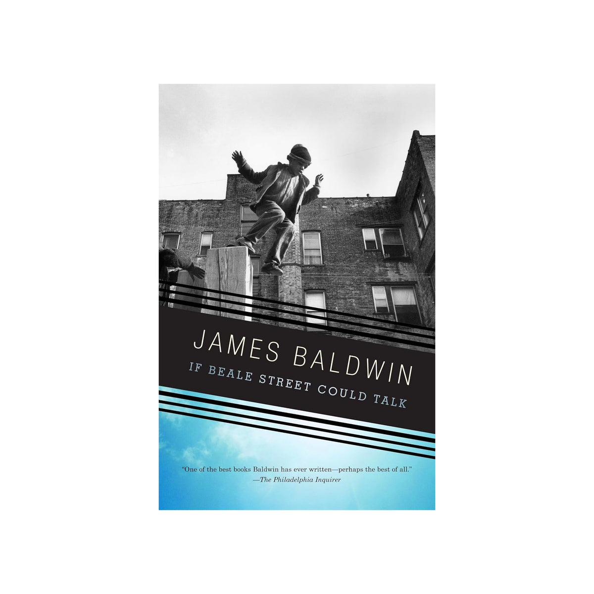 Book cover of 'If Beale Street Could Talk' by James Baldwin with a black and white photo of a man on a roof.