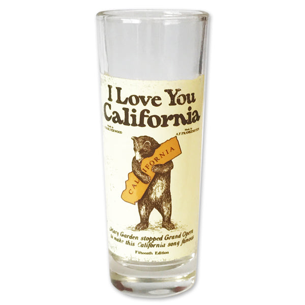 The iconic design on this state-themed shot glass was inspired by vintage artwork from the 1913 sheet music cover of California's state song "I Love You California". Glass Measures 1 1/2 wide x 4" tall. Hand-wash